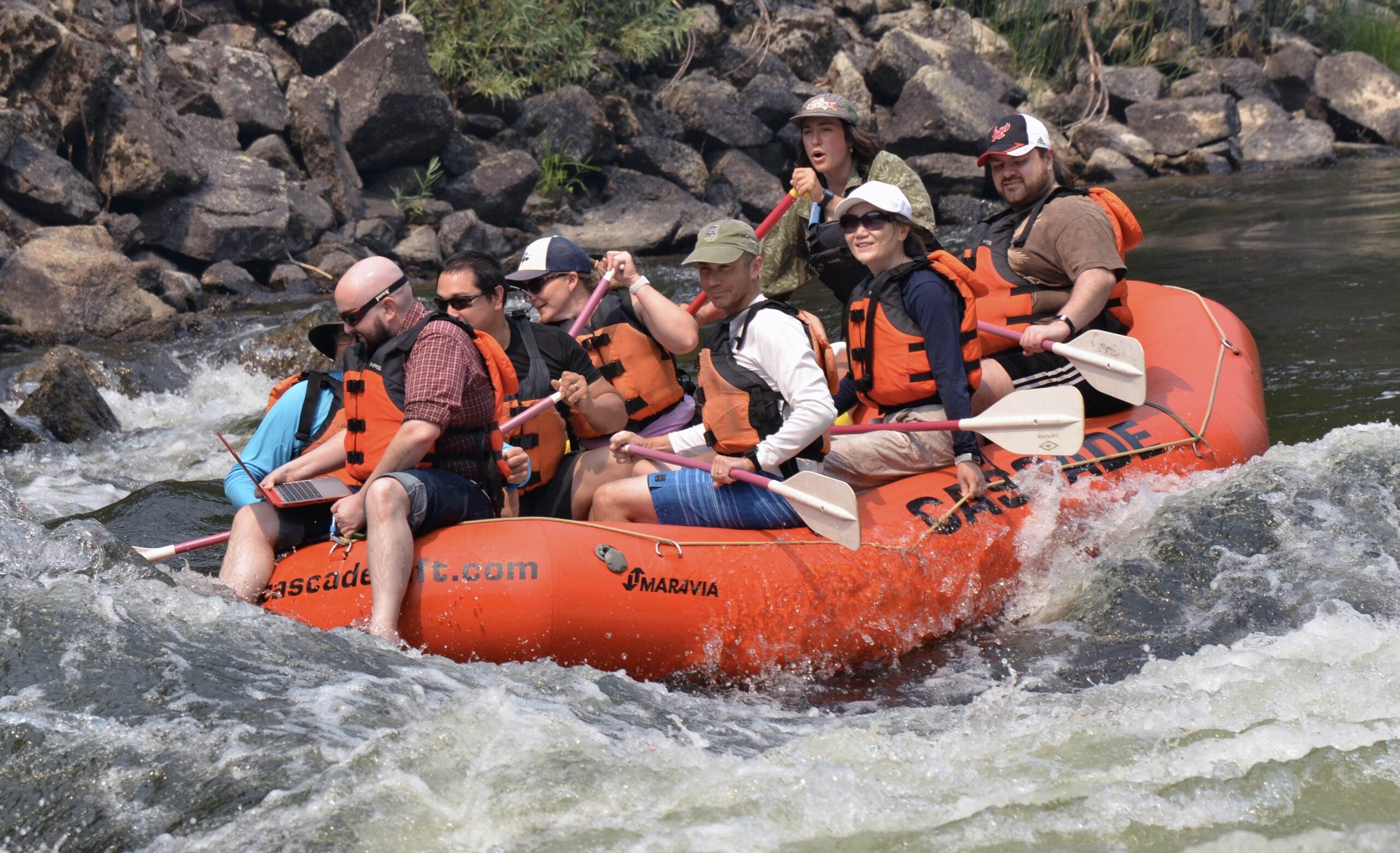 Chance's team rafting the river.